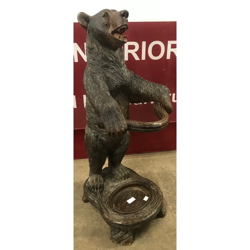 105 - A 19th Century Century Black Forest carved wood bear stickstand