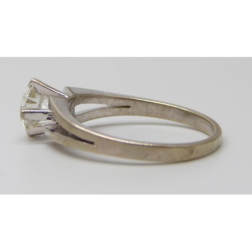 7007 - A 9ct white gold ring set with a white stone, 2.6g, O/P