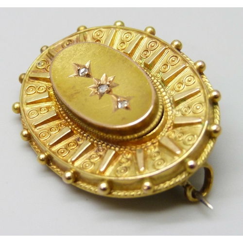 7008 - A Victorian 15ct gold brooch set with diamonds, mourning compartment verso, 5.7g, 3.1cm