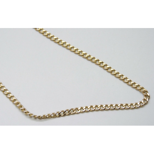 7016 - A 9ct gold curb chain necklace, 8.8g, 60.5cm