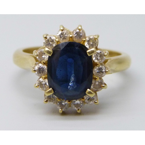 7017 - An 18ct gold, sapphire and diamond ring, 7.3g, R, sapphire approximately 9 x 7mm, and a pair of 18ct... 