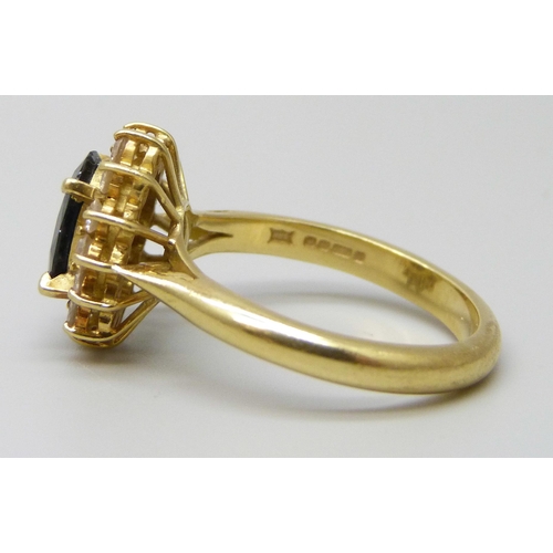 7017 - An 18ct gold, sapphire and diamond ring, 7.3g, R, sapphire approximately 9 x 7mm, and a pair of 18ct... 