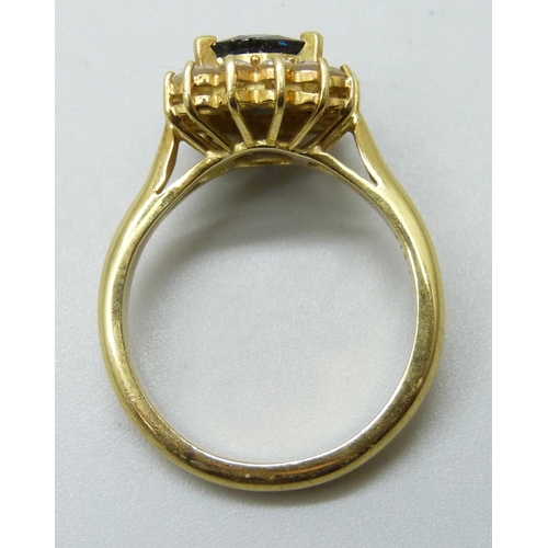 7017 - An 18ct gold, sapphire and diamond ring, 7.3g, R, sapphire approximately 9 x 7mm, and a pair of 18ct... 