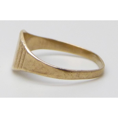 7025 - A small 9ct gold signet ring, 0.7g, D