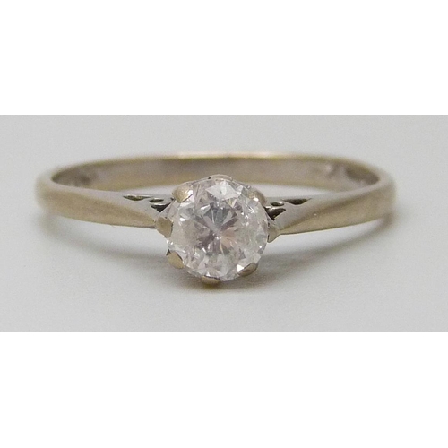 7030 - An 18ct gold diamond solitaire ring, shank stamped .50, 2.1g, M