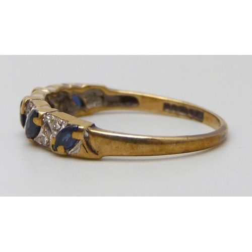 7041 - A 9ct gold blue stone and diamond ring, 1.6g, N/O