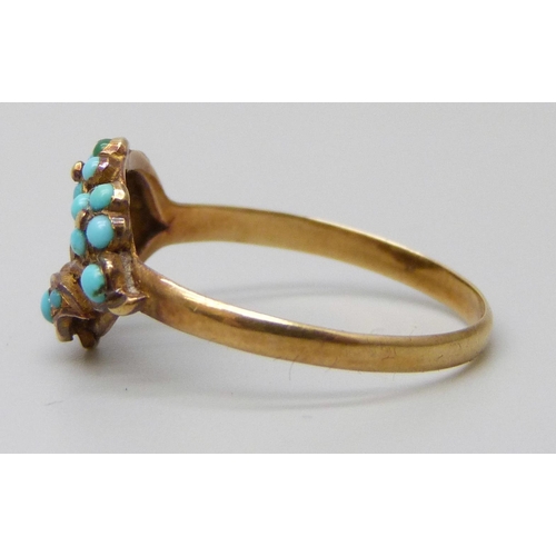 7051 - A yellow metal turquoise set ring, 1.6g, M, (one stone missing)