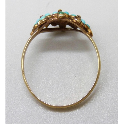 7051 - A yellow metal turquoise set ring, 1.6g, M, (one stone missing)