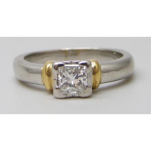 7057 - A platinum and 18ct gold set 0.5ct princess cut diamond solitaire ring, 7.2g, J/K