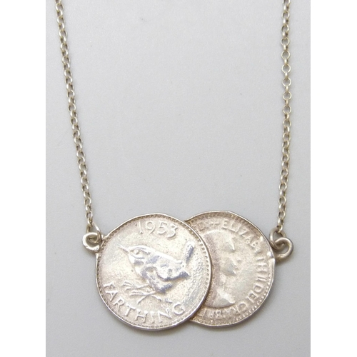 7062 - A farthing pendant with silver chain, 48cm