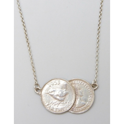 7062 - A farthing pendant with silver chain, 48cm