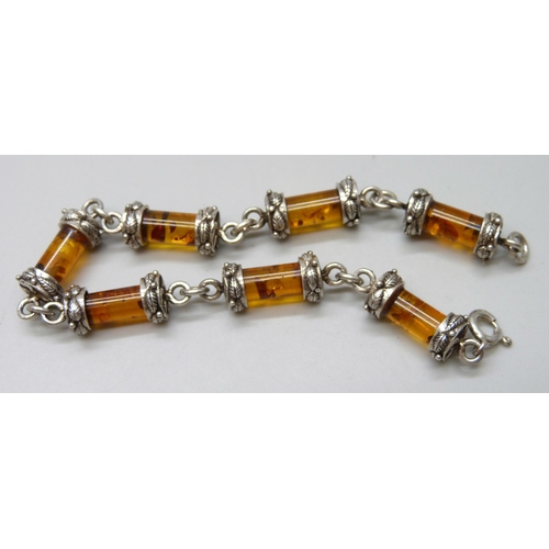 7073 - A silver mounted amber bracelet, 24g, 20cm