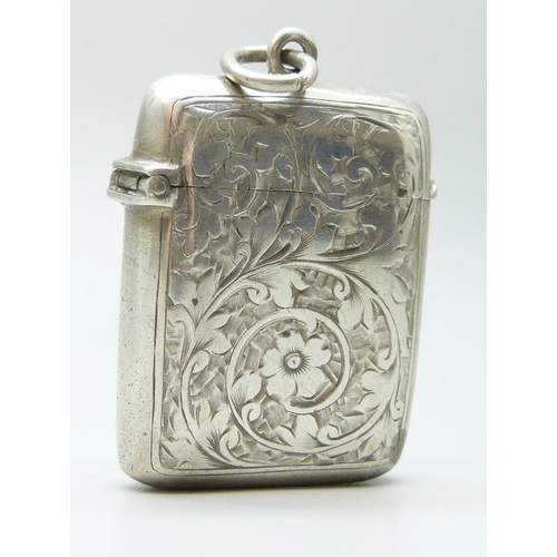 7077 - An engraved silver vesta case, Chester marks (worn), 32g