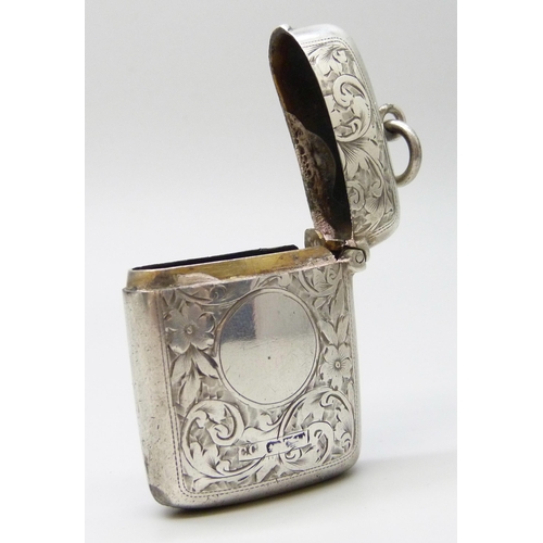 7077 - An engraved silver vesta case, Chester marks (worn), 32g