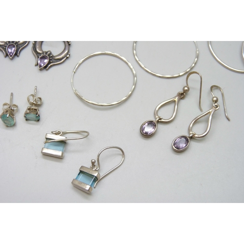 7089 - Seven pairs of silver earrings, 23g, together with three unmarked pairs of white metal earrings