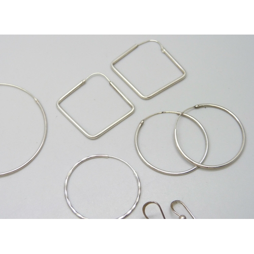 7089 - Seven pairs of silver earrings, 23g, together with three unmarked pairs of white metal earrings