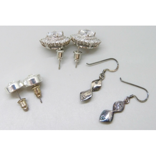 7091 - Two pairs of silver earrings - white stone clusters and drop twist design, together with a pair of p... 