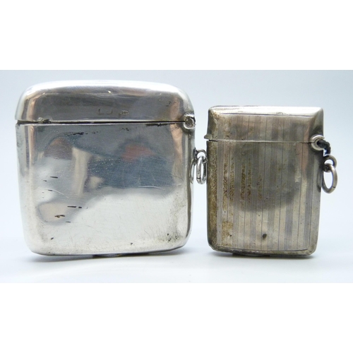 7092 - A silver vesta case, Chester 1909, together with a smaller example, a/f, 64g total