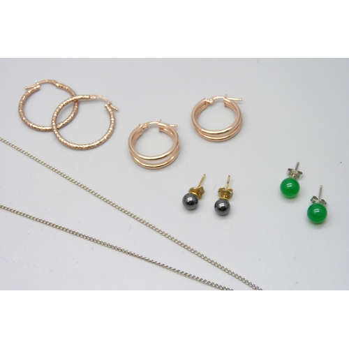 7098 - Two pairs of silver gilt hoop earrings, a silver dragon pendant on chain, three pairs of stud earrin... 