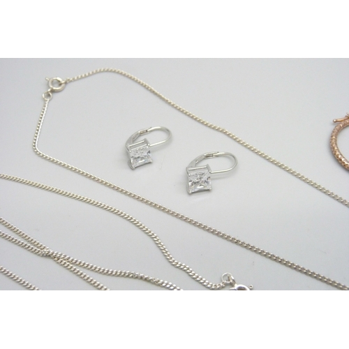 7098 - Two pairs of silver gilt hoop earrings, a silver dragon pendant on chain, three pairs of stud earrin... 