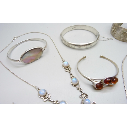 7100 - A collection of silver jewellery including bracelets and necklaces, 113g together with an Eastern me... 