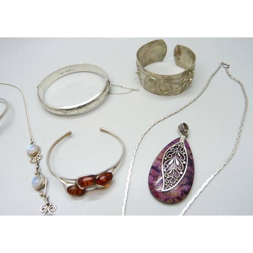 7100 - A collection of silver jewellery including bracelets and necklaces, 113g together with an Eastern me... 