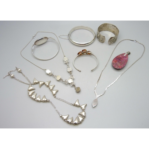 7100 - A collection of silver jewellery including bracelets and necklaces, 113g together with an Eastern me... 