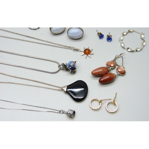 7103 - A collection of silver jewellery including earrings, necklaces, brooches, etc., 89g