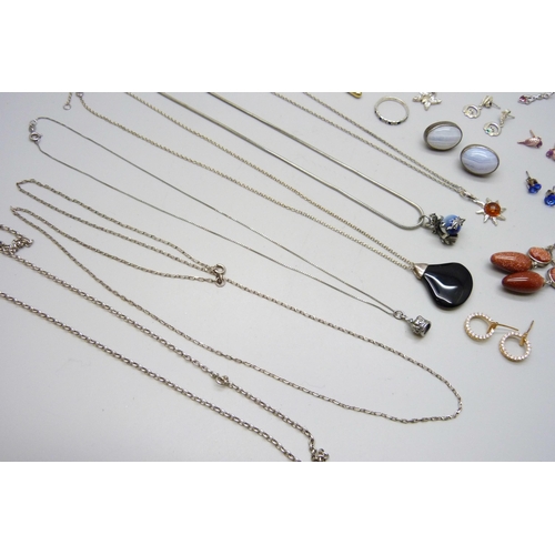 7103 - A collection of silver jewellery including earrings, necklaces, brooches, etc., 89g