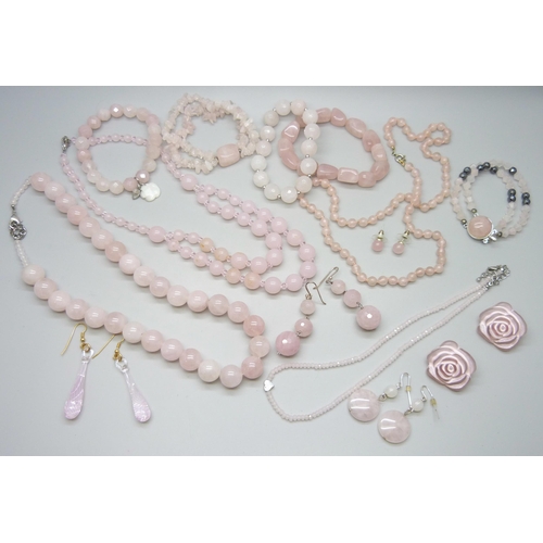 7115 - A collection of rose quartz jewellery - necklaces and bracelets, and a pair of glass drop earrings