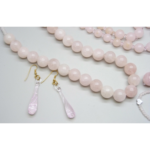 7115 - A collection of rose quartz jewellery - necklaces and bracelets, and a pair of glass drop earrings