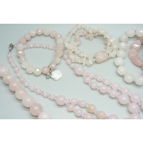 7115 - A collection of rose quartz jewellery - necklaces and bracelets, and a pair of glass drop earrings