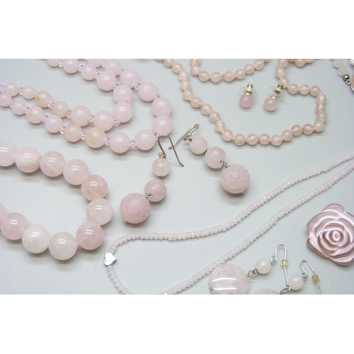 7115 - A collection of rose quartz jewellery - necklaces and bracelets, and a pair of glass drop earrings