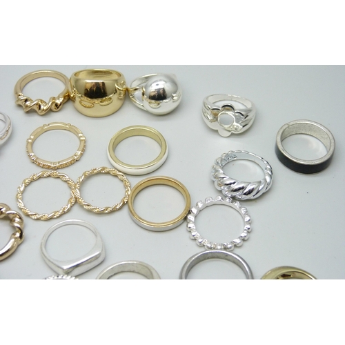 7126 - Forty-nine gold and silver tone costume rings