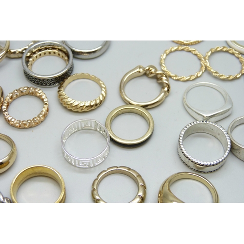 7126 - Forty-nine gold and silver tone costume rings