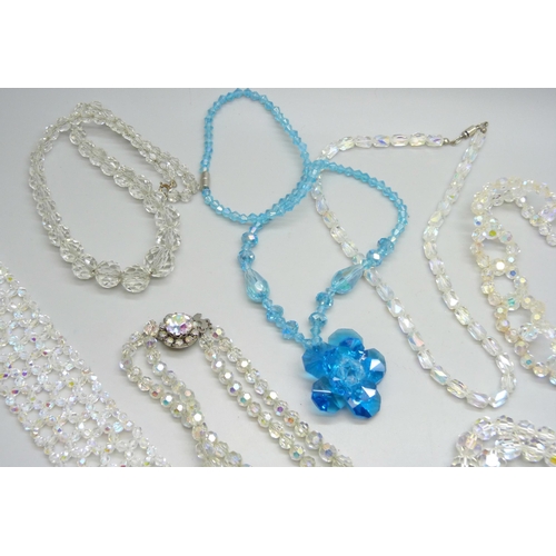 7128 - A collection of crystal style bracelets and necklaces