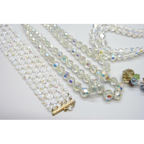 7128 - A collection of crystal style bracelets and necklaces