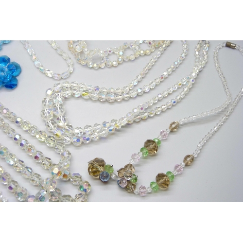 7128 - A collection of crystal style bracelets and necklaces