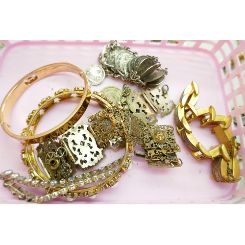 7130 - A collection of costume bracelets and bangles