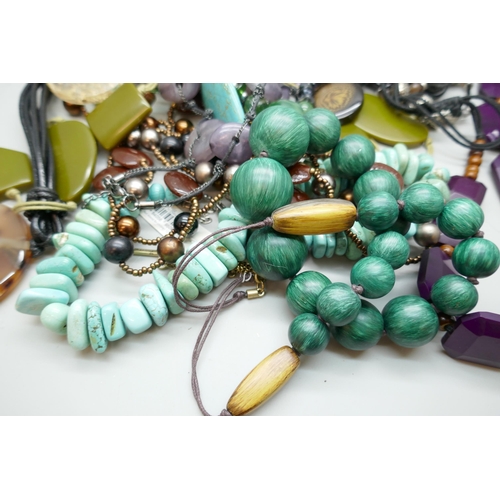 7155 - A collection of statement necklaces including Laura Ashley, Envy, Kenneth Cole and others