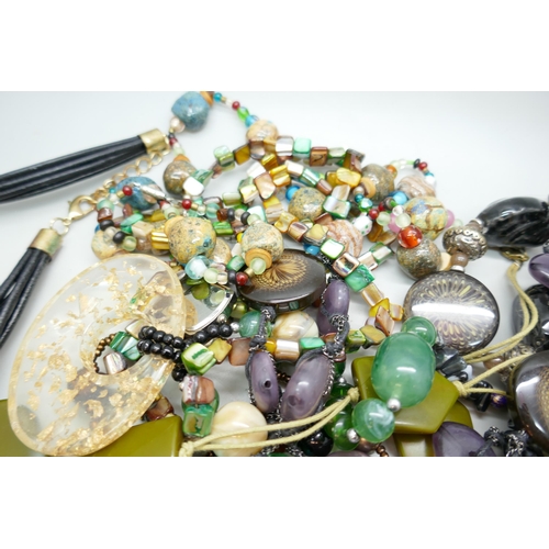 7155 - A collection of statement necklaces including Laura Ashley, Envy, Kenneth Cole and others