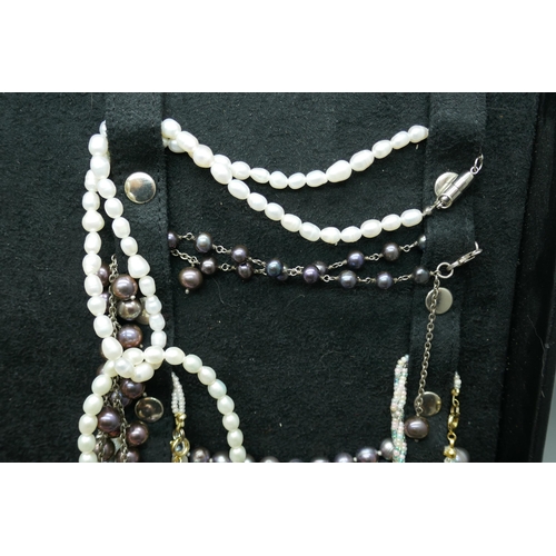 7158 - A selection of pearl necklaces, various lengths and colours, including silver clasps