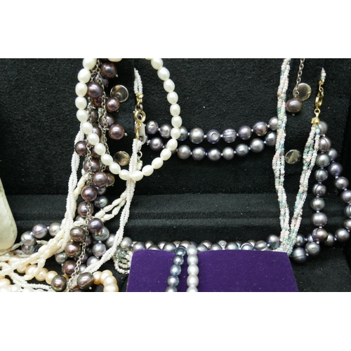 7158 - A selection of pearl necklaces, various lengths and colours, including silver clasps