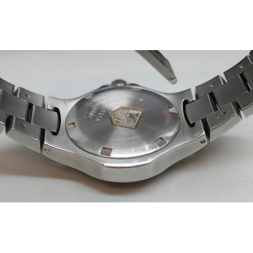 7162 - A lady's Tag Heuer stainless steel quartz wristwatch, boxed