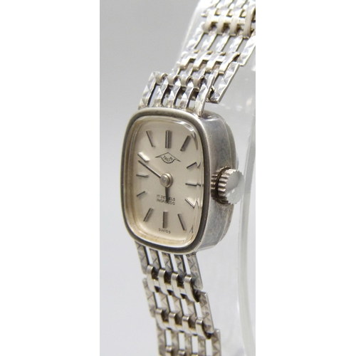 7184 - A lady's Talis silver wristwatch, 16mm including crown