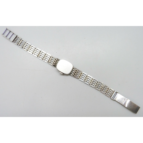 7184 - A lady's Talis silver wristwatch, 16mm including crown