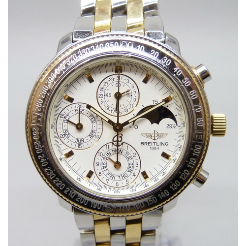 7189 - A Breitling Chrono 1461 wristwatch with moonphase dial, 42mm including crown, with box and papers