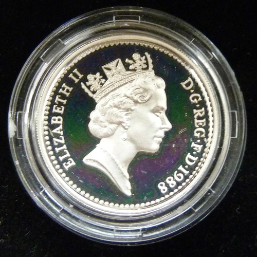 7229 - Two Royal Mint UK Silver Proof £1 coins and a 1973 50p, all cased