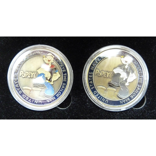 7231 - A Pair of Popeye The Sailor Man medals, crown sized, unmatched certificate, boxed