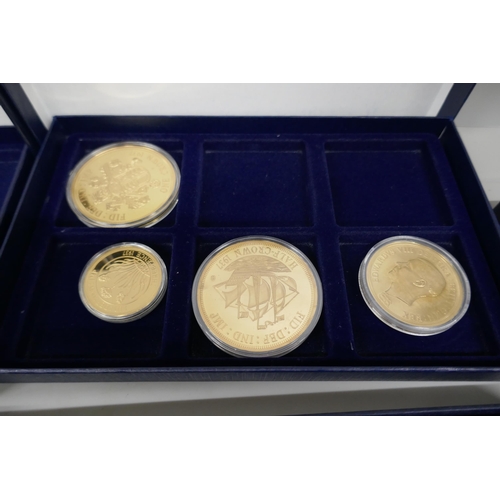 7235 - Seven boxes with a collection of commemorative coins